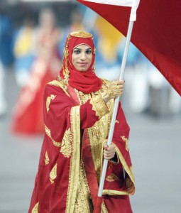 Ruqayya Al-Ghasra leading the Bahraini Olympic team at the opening ceremony of the Olympic games